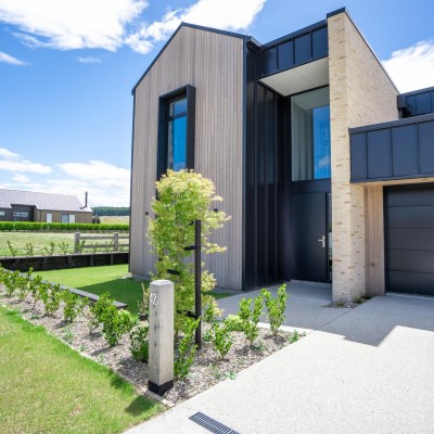 A Functional Garden with Lawn Spaces and Landscape Views
